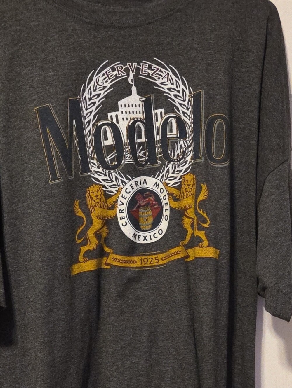 ModelCo Charcoal Crest Tee with Gold Emblem